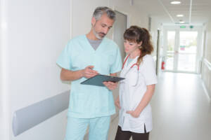 doctor and nurse at hospital corridor