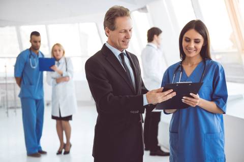 hospital manager with nurse hospital manager with nurse