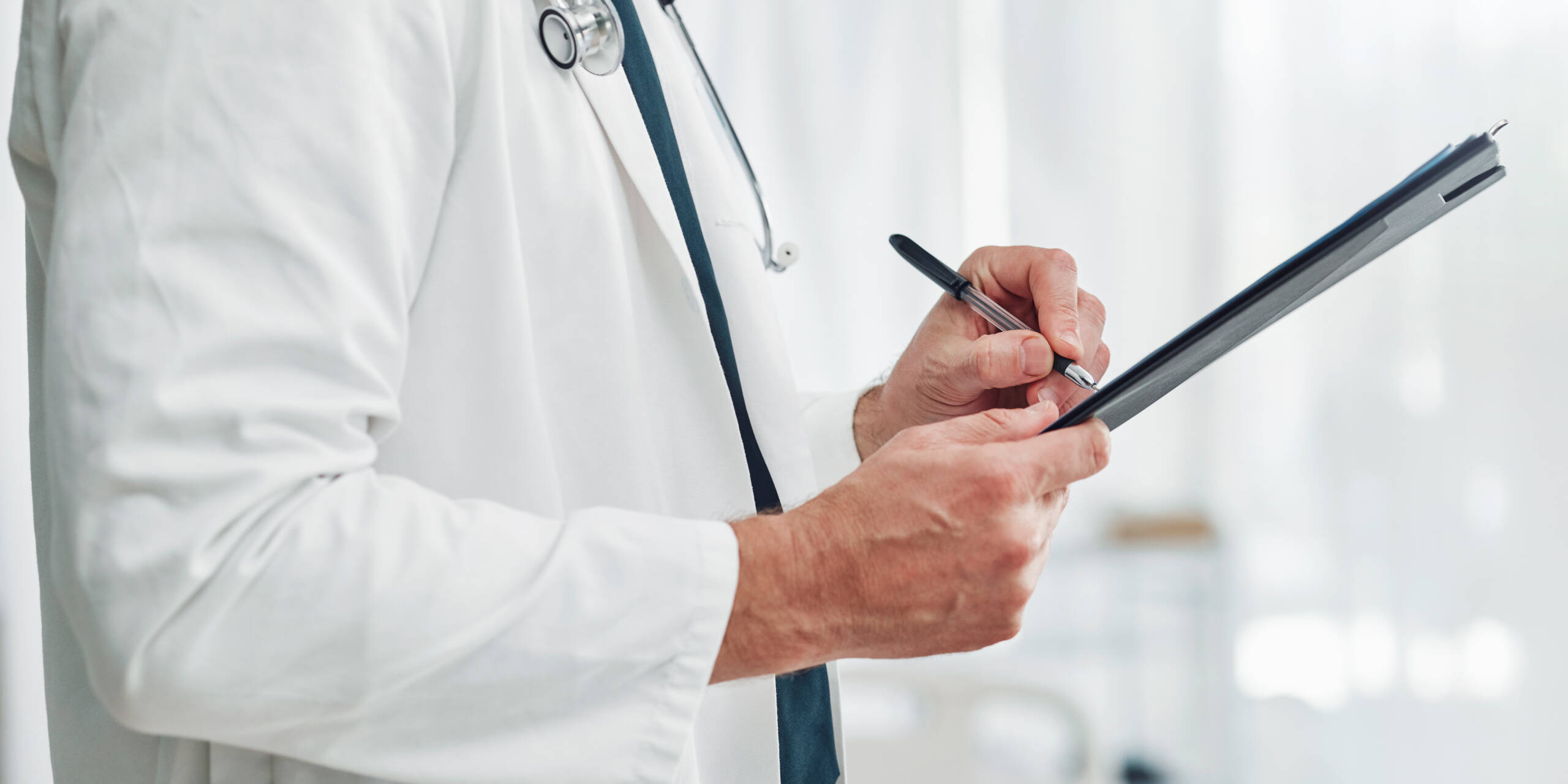 Doctor, clipboard or hands writing checklist for healthcare consulting, medical information or prescription. Nurse, medicine or worker with documents, wellness report planning or paper administration healthcare administrators