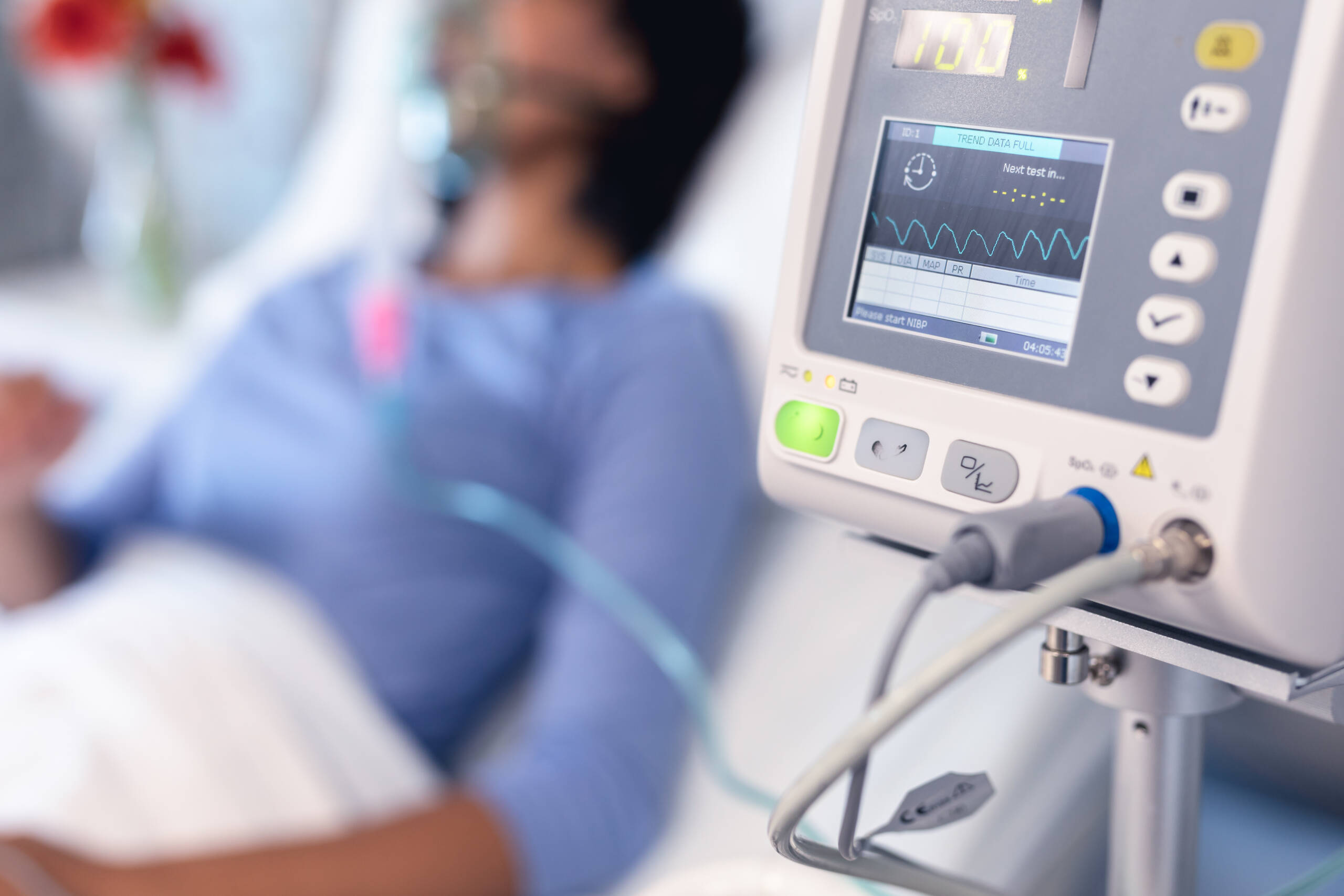Up close image of a ventilator monitor operated by a respiratory therapist