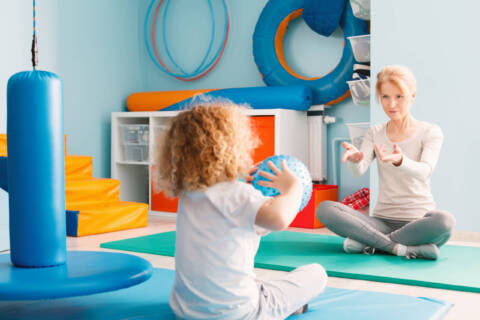 occupational therpay in pediatric care a child is working with an occupational therapist in pediatric care