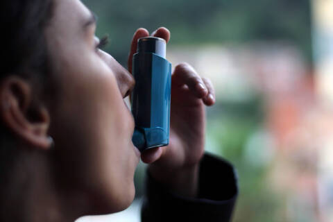 Inhaler Techniques person using inhaler
