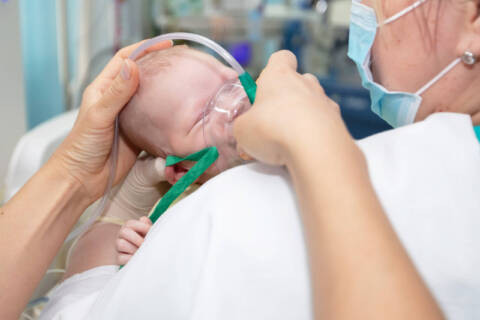 Respiratory Therapy for Babies Baby with an oxygen mask
