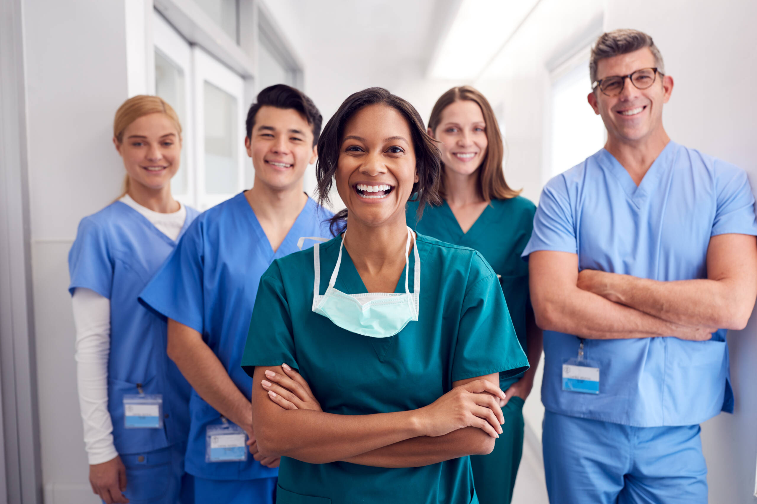 group of happy male and female nurses